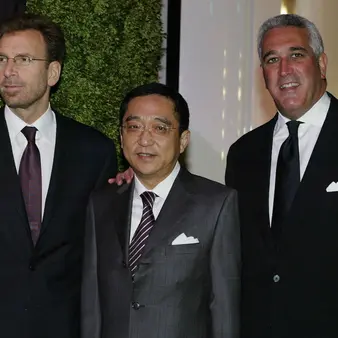 Meet The Two Hidden Billionaires Who Own Michael Kors, Jimmy Choo And Now Versace