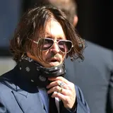 Amber Heard Exploded When Depp Lost $750 Million And Allegedly Threw A Punch At Him