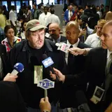 Denver Reporter Confronts Michael Moore about $50 Million Net Worth