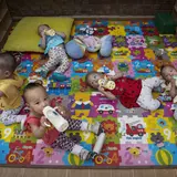 Millionaire Chinese Woman Spends Her Entire Fortune Adopting 75 Orphans