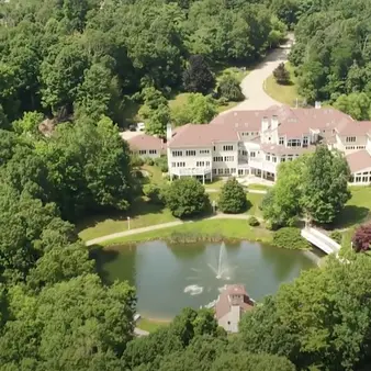 The Insane Cursed History Of Mike Tyson & 50 Cent's Former Connecticut Mansion (Which Was Just Listed For $10m)