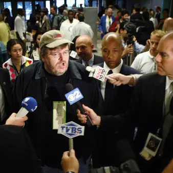 Denver Reporter Confronts Michael Moore about $50 Million Net Worth