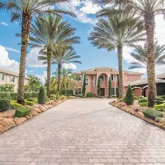 Rick Ross Slashes $125k From Mansion Price Tag