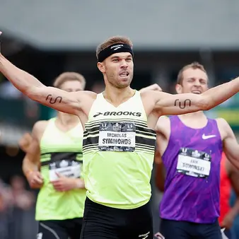 T-Mobile CEO John Legere Buys Ad Space On Shoulder Of Olympian Runner Nick Symmonds