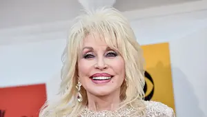 Thumbnail for Dolly Parton: Big Hair, Big Voice, Big Shoes… Ginormous Bank Account.