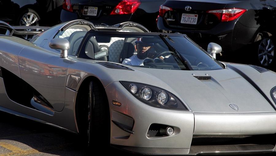 Floyd Mayweather Jr. arrives at the Mayweather Boxing Club in his new $4.8 million Koenigsegg CCXR Trevita car for a workout on August 26, 2015 in Las Vegas. Mayweather will meet Andre Berto in a welterweight title bout September 12, 2015, at the MGM Grand Garden Arena in Las Vegas. AFP PHOTO/JOHN GURZINSKI (Photo credit should read JOHN GURZINSKI/AFP/Getty Images)