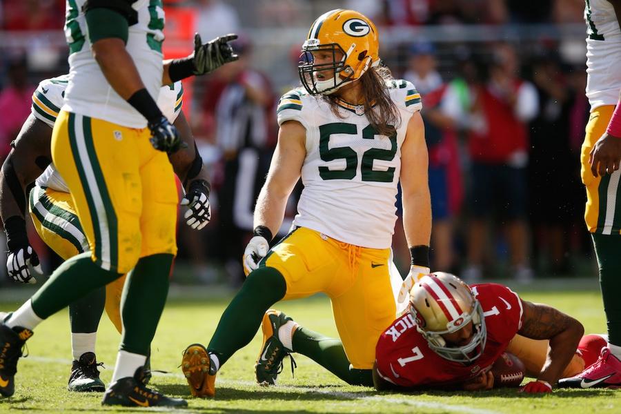 SANTA CLARA, CA - OCTOBER 04: Inside linebacker Clay Matthews #52 of the Green Bay Packers kneels on the field after sacking quarterback Colin Kaepernick #7 of the San Francisco 49ers during their NFL game at Levi's Stadium on October 4, 2015 in Santa Clara, California. (Photo by Ezra Shaw/Getty Images)