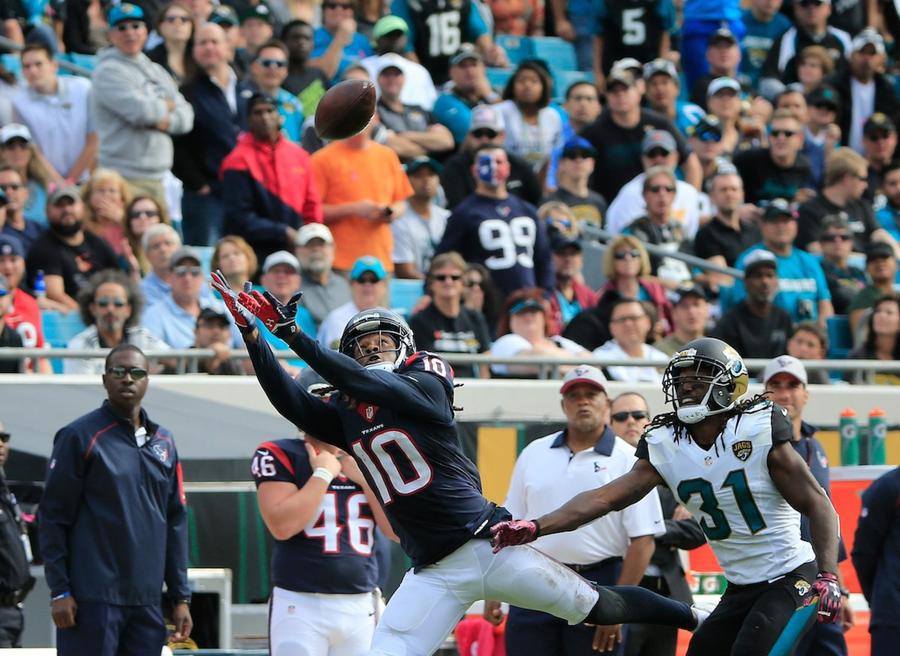 JACKSONVILLE, FL - OCTOBER 18: DeAndre Hopkins #10 of the Houston Texans attempts a reception against Davon House #31 of the Jacksonville Jaguars during the game at EverBank Field on October 18, 2015 in Jacksonville, Florida. (Photo by Sam Greenwood/Getty Images)