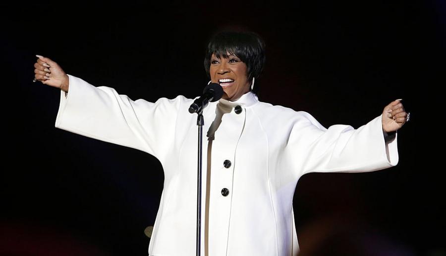 WASHINGTON, DC - DECEMBER 04: Singer Patti LaBelle performs during the lighting of the National Christmas tree with first lady Michelle Obama on December 4, 2014 in Washington, DC. The tree lighting ceremony marks a month-long series of holiday events in President's Park at The White House. (Photo by Chris Kleponis-Pool/Getty Images)