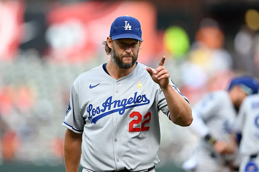 Clayton Kershaw pointing at a teammate.
