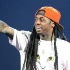 Lil Wayne Sued By Security Guard For An Alleged "Hate Crime"