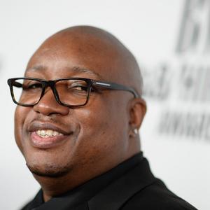 The 55-year old son of father (?) and mother(?) E-40 in 2023 photo. E-40 earned a  million dollar salary - leaving the net worth at  million in 2023