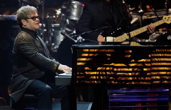 Elton John is all smiles after dropping $1 million on a new piano