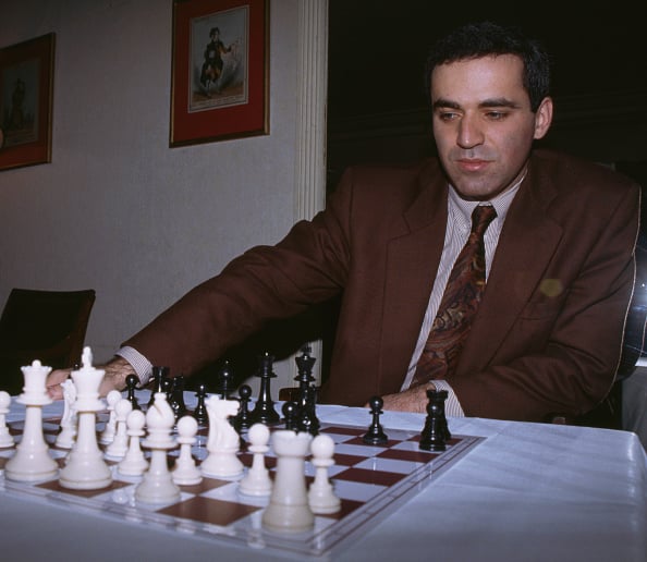 Kasparov's reaction to playing 13yr old Magnus Carlsen : r