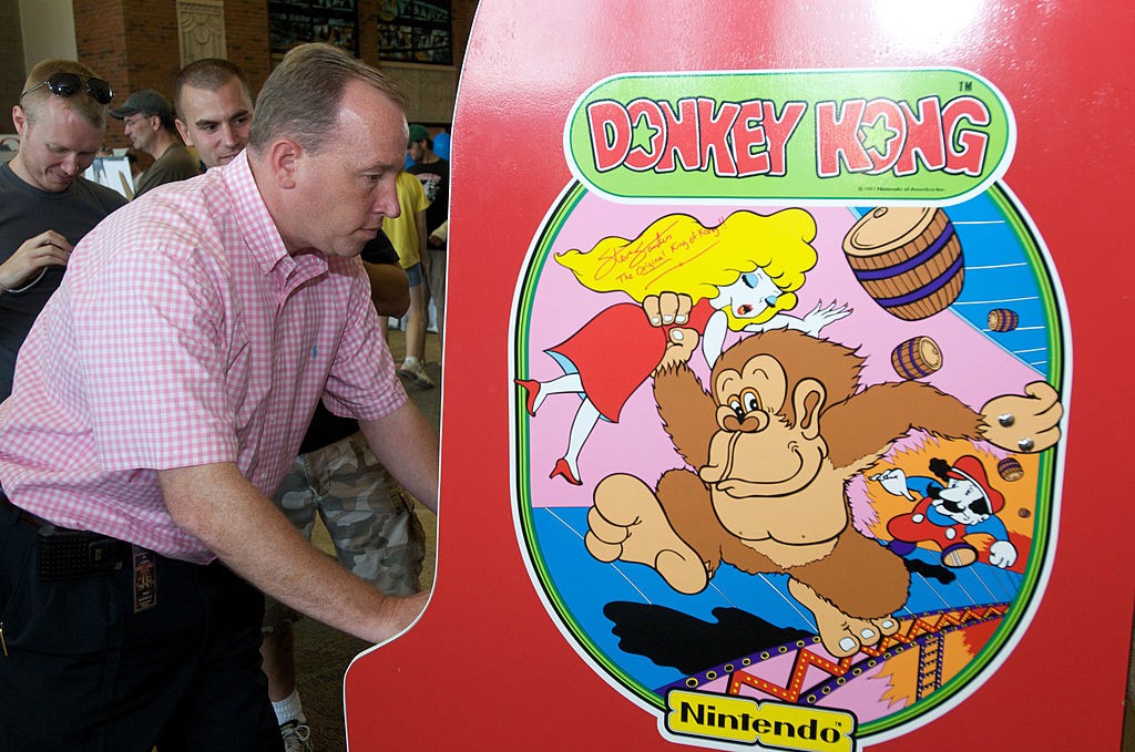 OTTUMWA, IA - AUGUST 13: Steve Sanders, 'The Orignal King of Kong,' plays Donkey Kong at the launch party for the International Video Game Hall of Fame and Museum on August 13, 2009 in Ottumwa, Iowa. Ottumwa was officially proclaimed the Video Game Capital of the World at the launch party and plans are underway to build a full museum in the small Iowa city. (Photo by David Greedy/Getty Images)