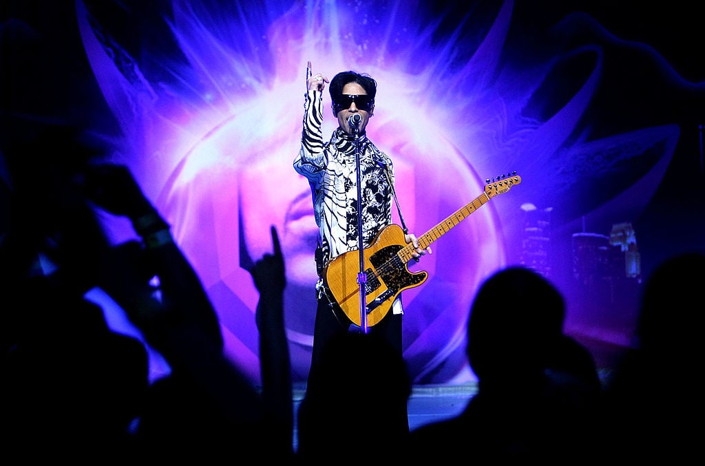 LOS ANGELES, CA - MARCH 28: ***EXCLUSIVE*** Musician Prince performs his first of three shows onstage during "One Night... Three Venues" hosted by Prince and Lotusflow3r.com held at NOKIA Theatre L.A. LIVE on March 28, 2009 in Los Angeles, California. (Photo by Kristian Dowling/Getty Images for Lotusflow3r.com)
