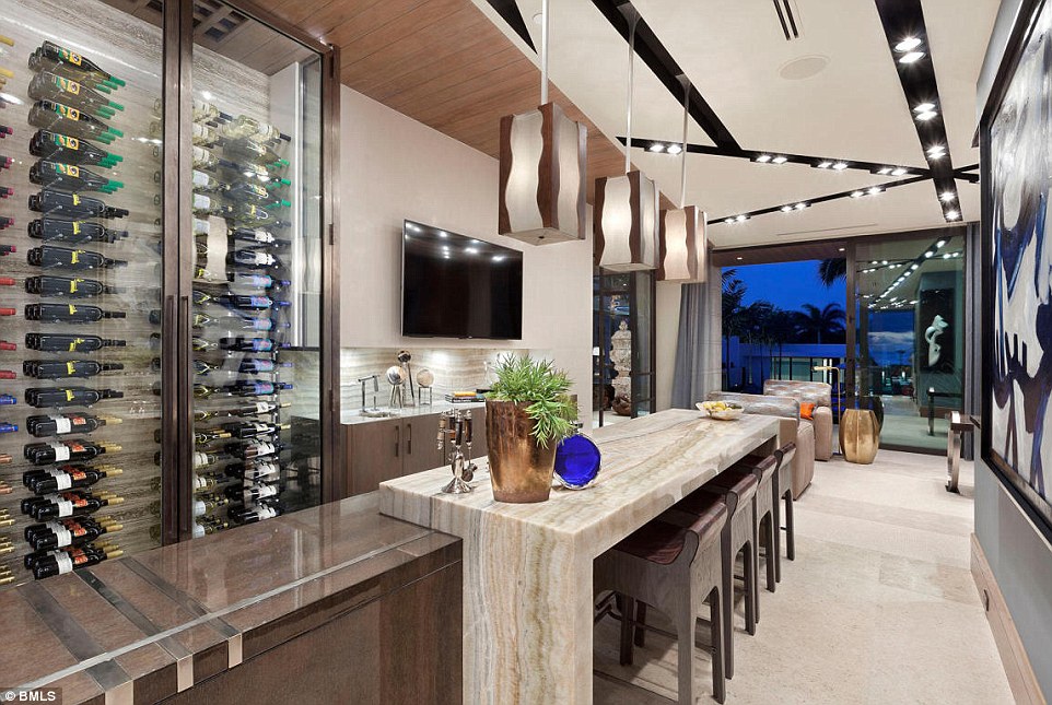 38f687e100000578-3816229-one_room_in_the_house_features_a_built_in_bar_and_a_wine_rack_th-a-36_1475257115289