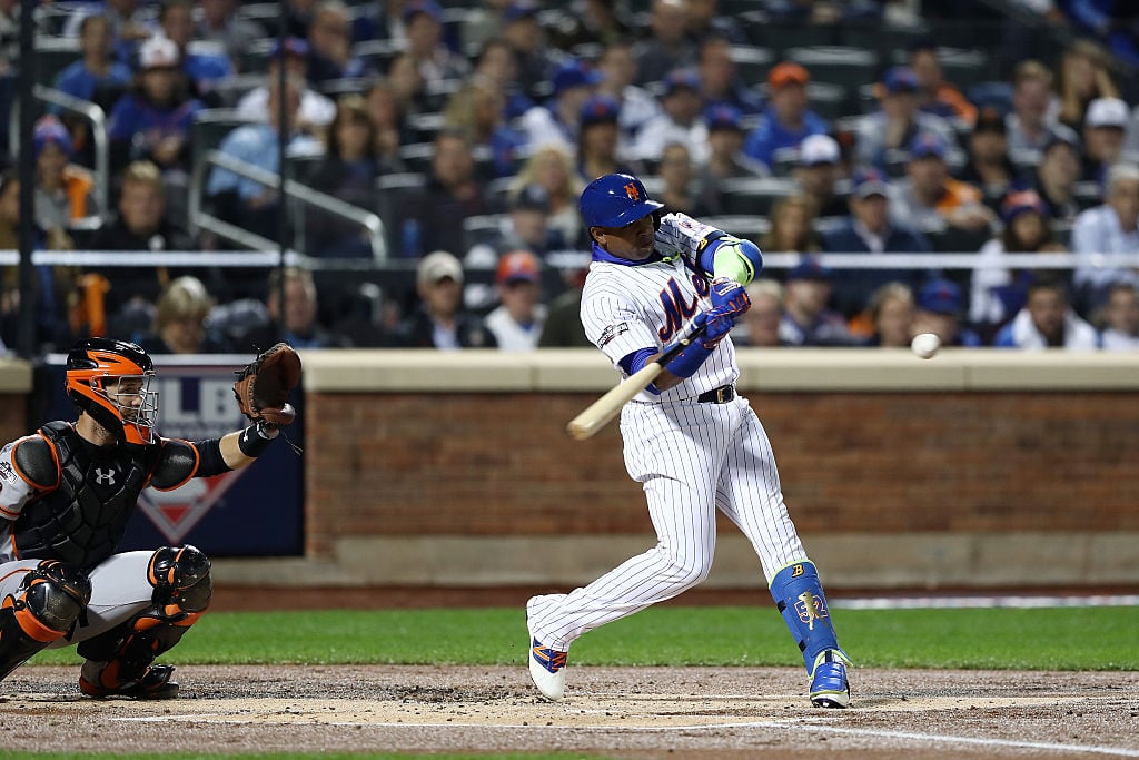 NEW YORK, NY - OCTOBER 05: Yoenis Cespedes #52 of the New York Mets bats against the San Francisco Giants in the first inning during their National League Wild Card game at Citi Field on October 5, 2016 in New York City. (Photo by Elsa/Getty Images)